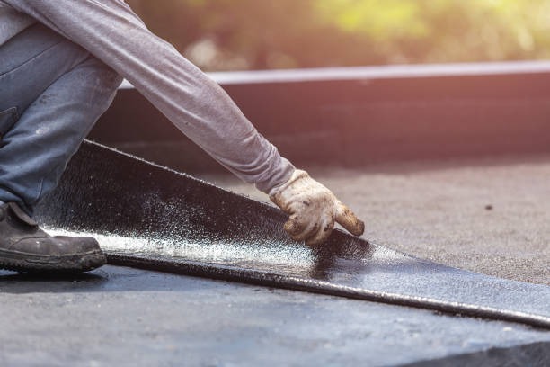 Professional Exterior Waterproofing technician working in Miller Place, NY
